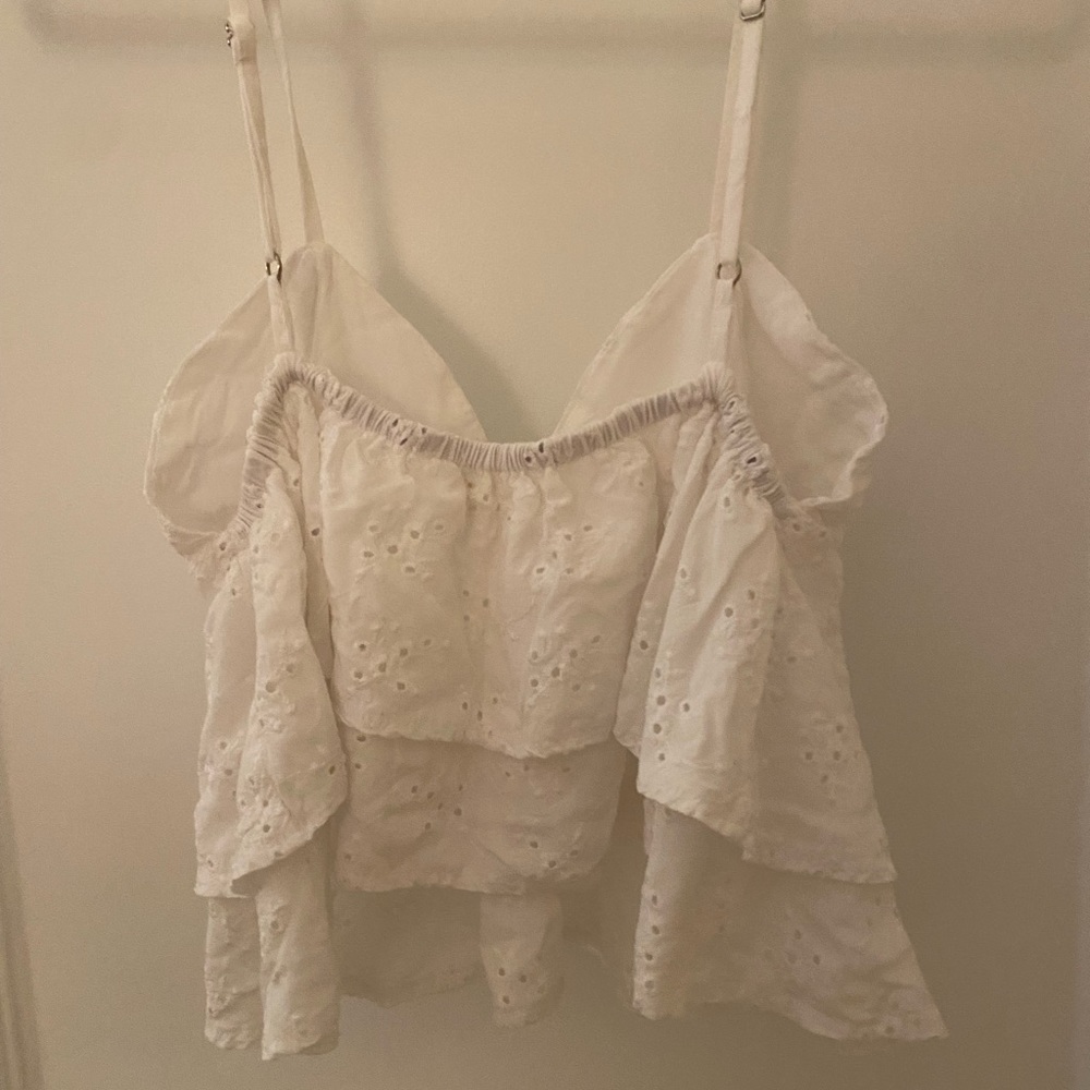 Eyelet crop top with slight peplum - Picture 2 of 3